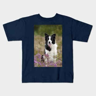 Border Collie Sitting in a Field of Flowers, Smiling With Tongue Out Kids T-Shirt